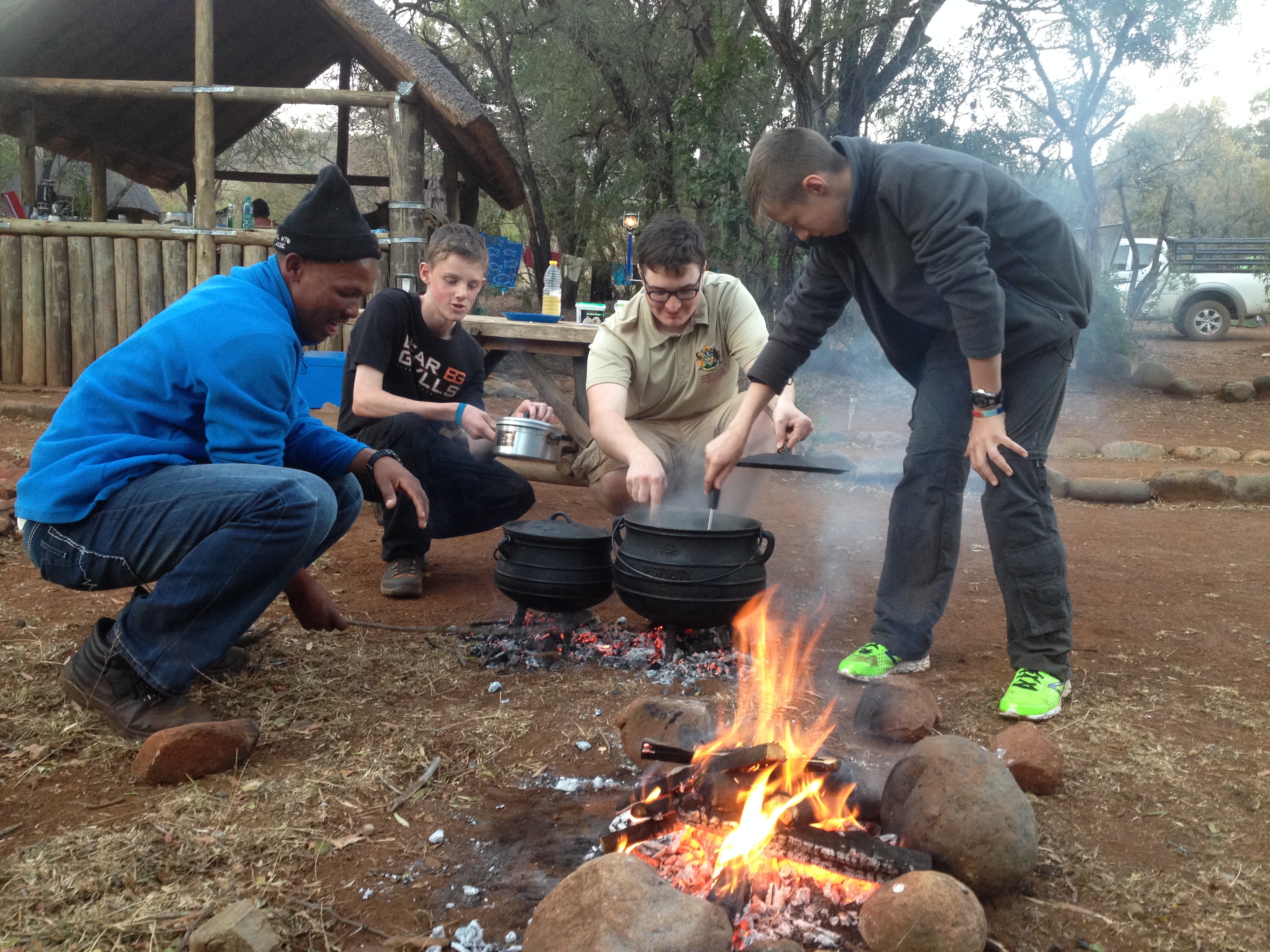 Kieran Walker, Todd Cross-Watson and Liam Holland-Bunch prepare a Potjie for the group’s evening meal